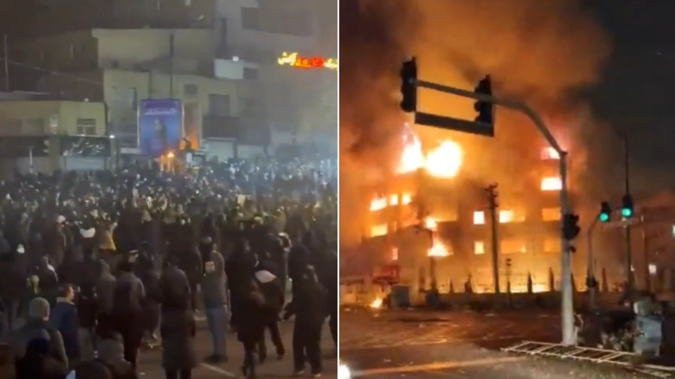 Iranian protesters on the march - and a local government municipality building burns
