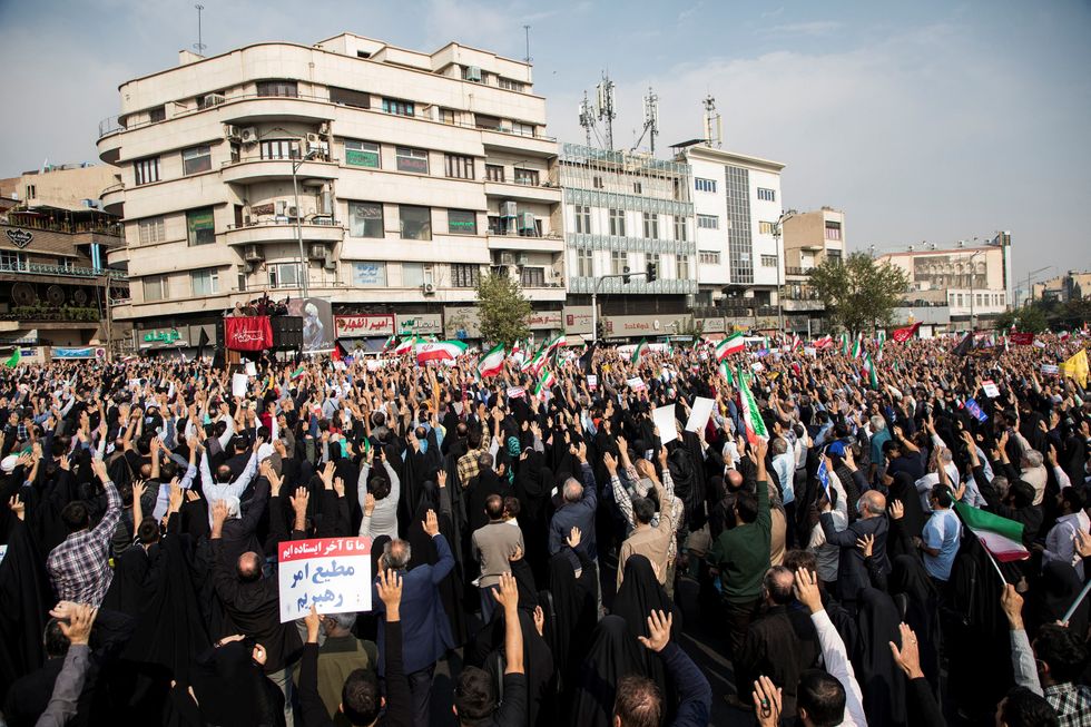 Iranians attend a protest condemning the Shiraz attack and unrest in Tehran, Iran October 28, 2022. WANA (West Asia News Agency) via REUTERS ATTENTION EDITORS - THIS PICTURE WAS PROVIDED BY A THIRD PARTY