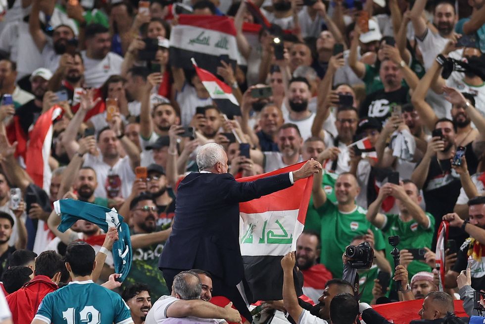Iraq fans celebrate their sensational World Cup qualifying win