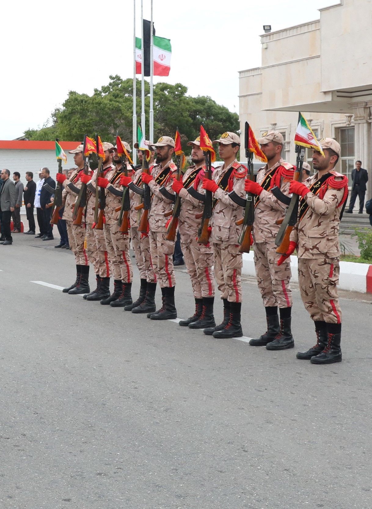 IRGC members holding Raisi's casket