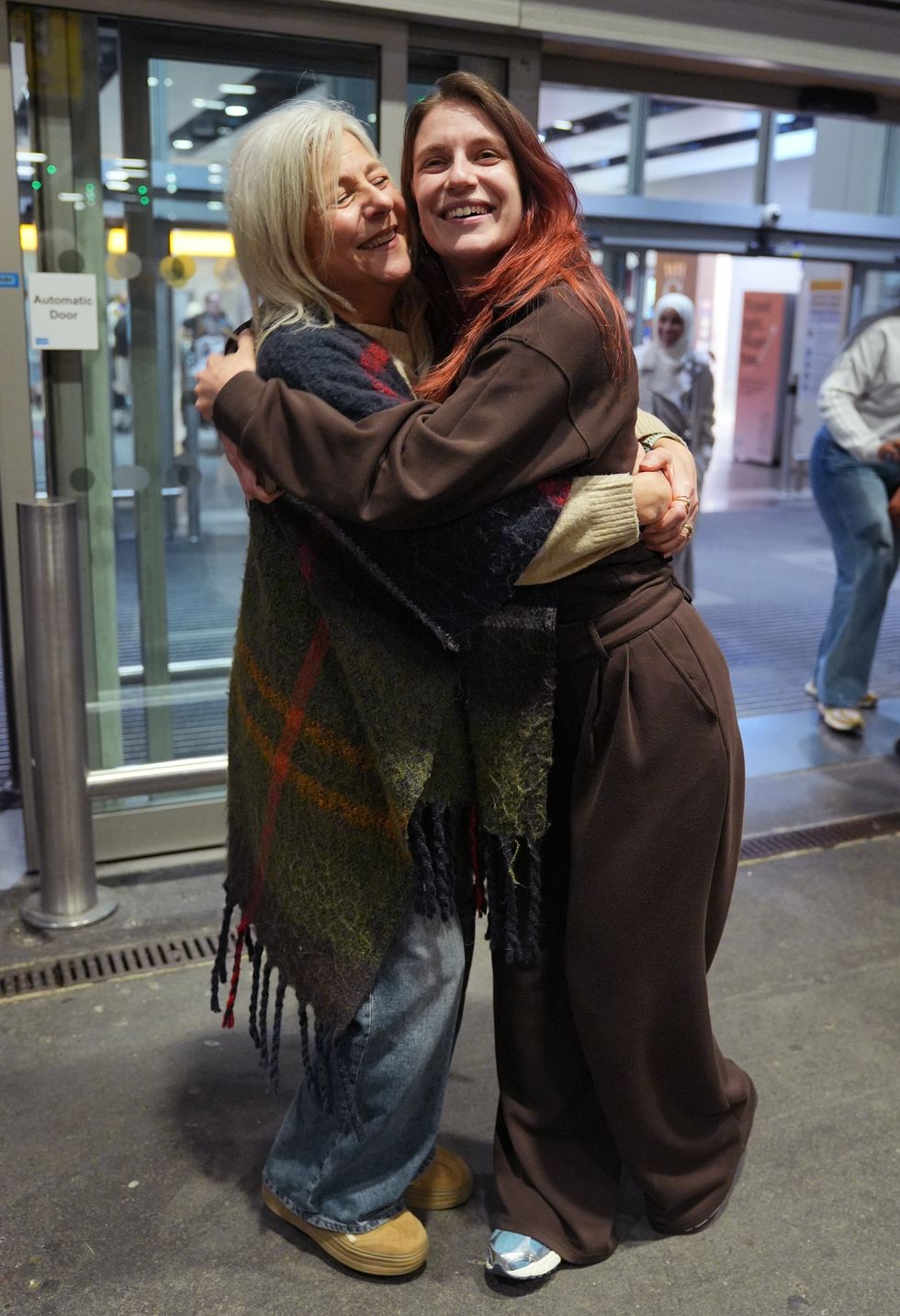 Isabel Robertson returns to England from the Middle East to Heathrow