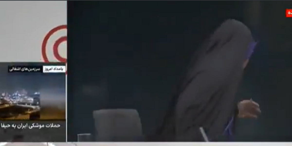 NextImg:Israel bombs offices of Iran's state TV with presenter LIVE on air
