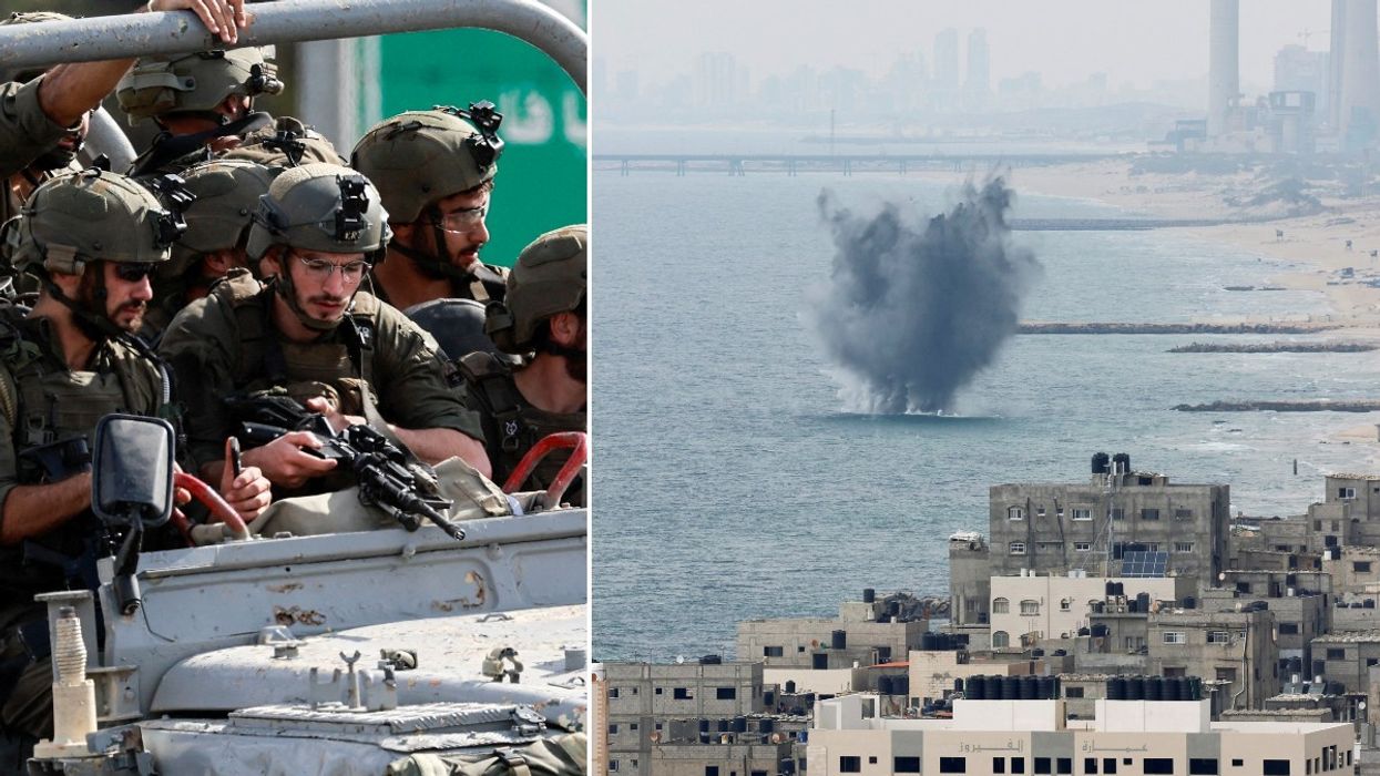 Israeli military drive on a road in southern Israel, as rockets are launched from the Gaza Strip and explosion in sea