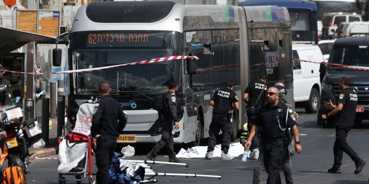 NextImg:Four dead after 'two terrorists' storm Jerusalem and open fire at busy bus stop
