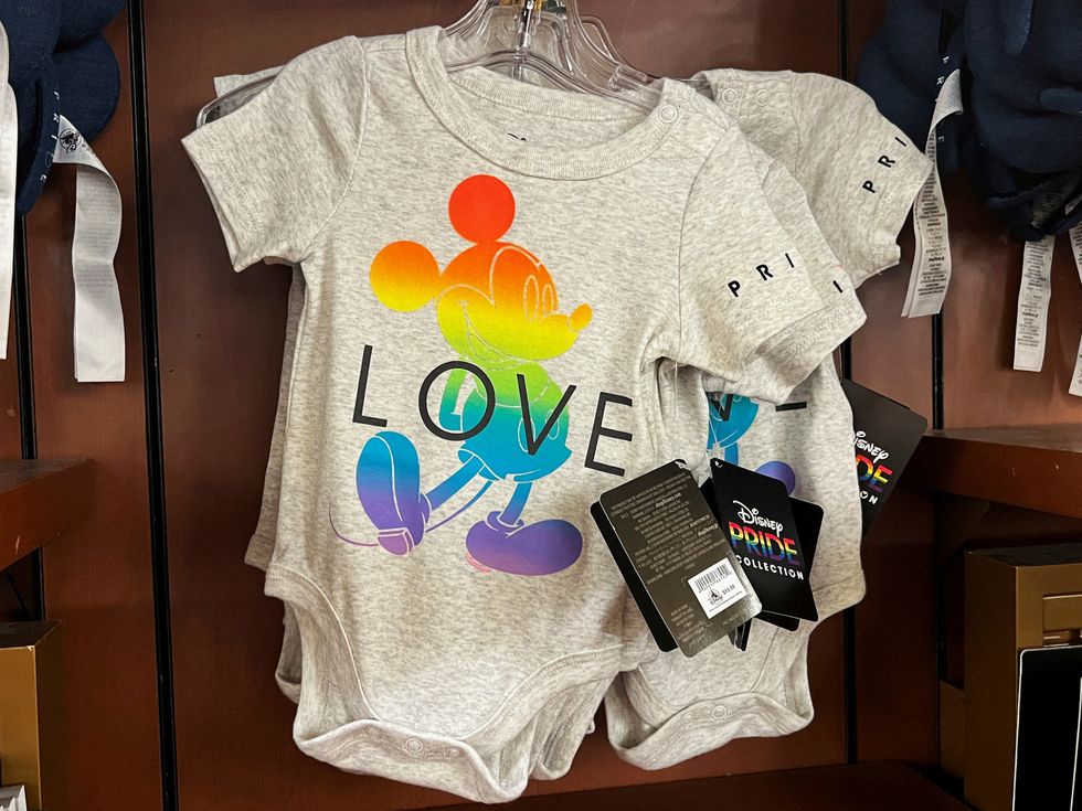 Items with a rainbow-coloured design are seen in a Pride section of a gift shop at the Walt Disney World Magic Kingdom theme park in Orlando, Florida