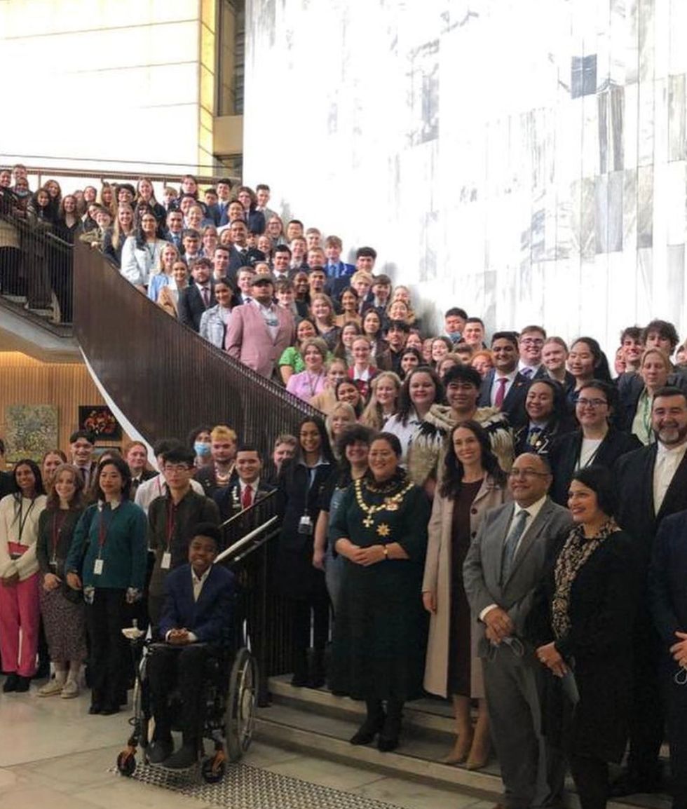 Jacinda Ardern posing for the picture without a mask