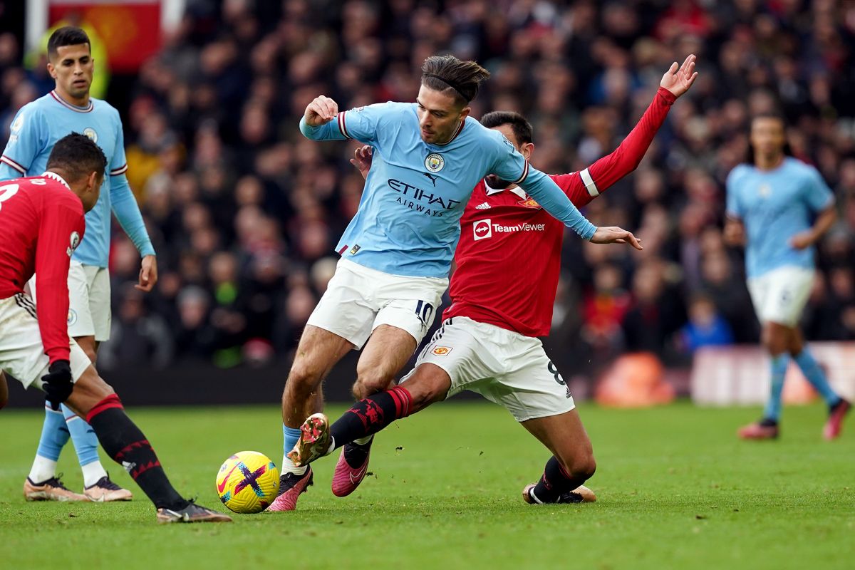 Jack Grealish in action for Manchester City against Manchester United at Old Trafford