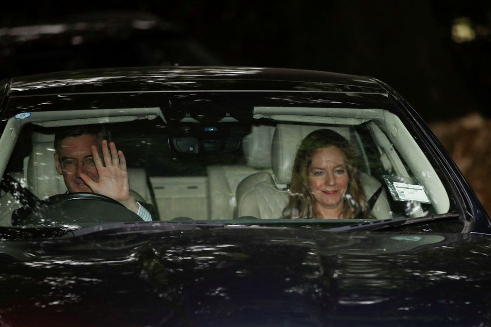 Jacob Rees-Mogg arrives at the event with his wife.