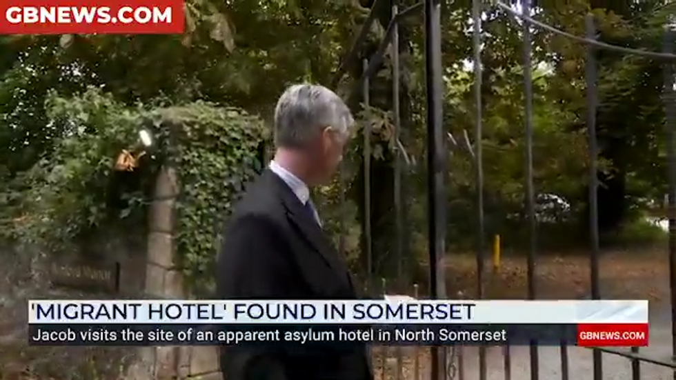 Jacob Rees-Mogg visits the site of an apparent asylum hotel