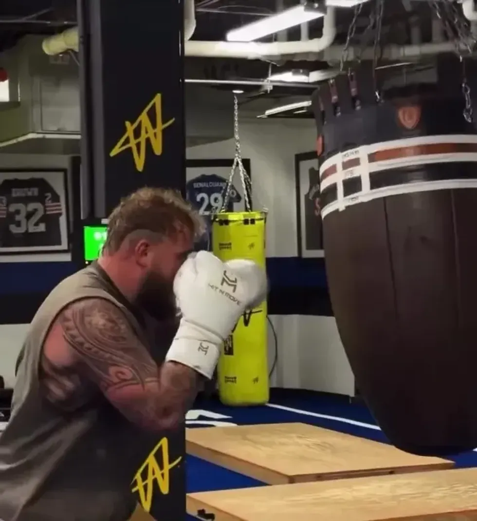 Jake Paul filmed himself hitting the pads in the gym