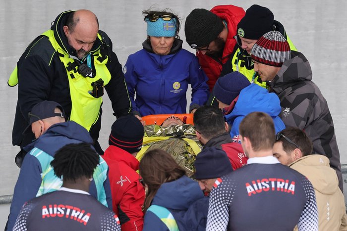 Jakob Mandlbauer's sled overturned on the U-shaped Curve 7 during the second heat of the competition