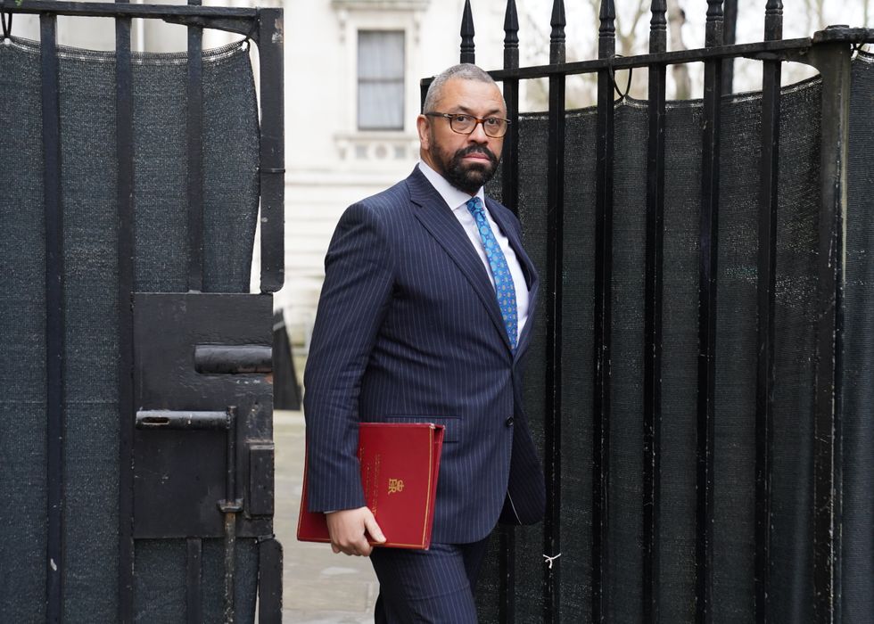 James Cleverly walking out of Downing Street