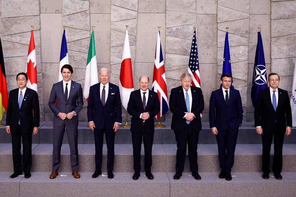 Japan's Prime Minister Fumio Kishida, Canada's Prime Minister Justin Trudeau, U.S. President Joe Biden, Germany's Chancellor Olaf Scholz, British Prime Minister Boris Johnson, France's President Emmanuel Macron, Italy's Prime Minister Mario Draghi pose for a G7 leaders' family photo during a Nato summit in Brussels, Belgium to discuss Russia's invasion of Ukraine. Picture date: Thursday March 24, 2022.