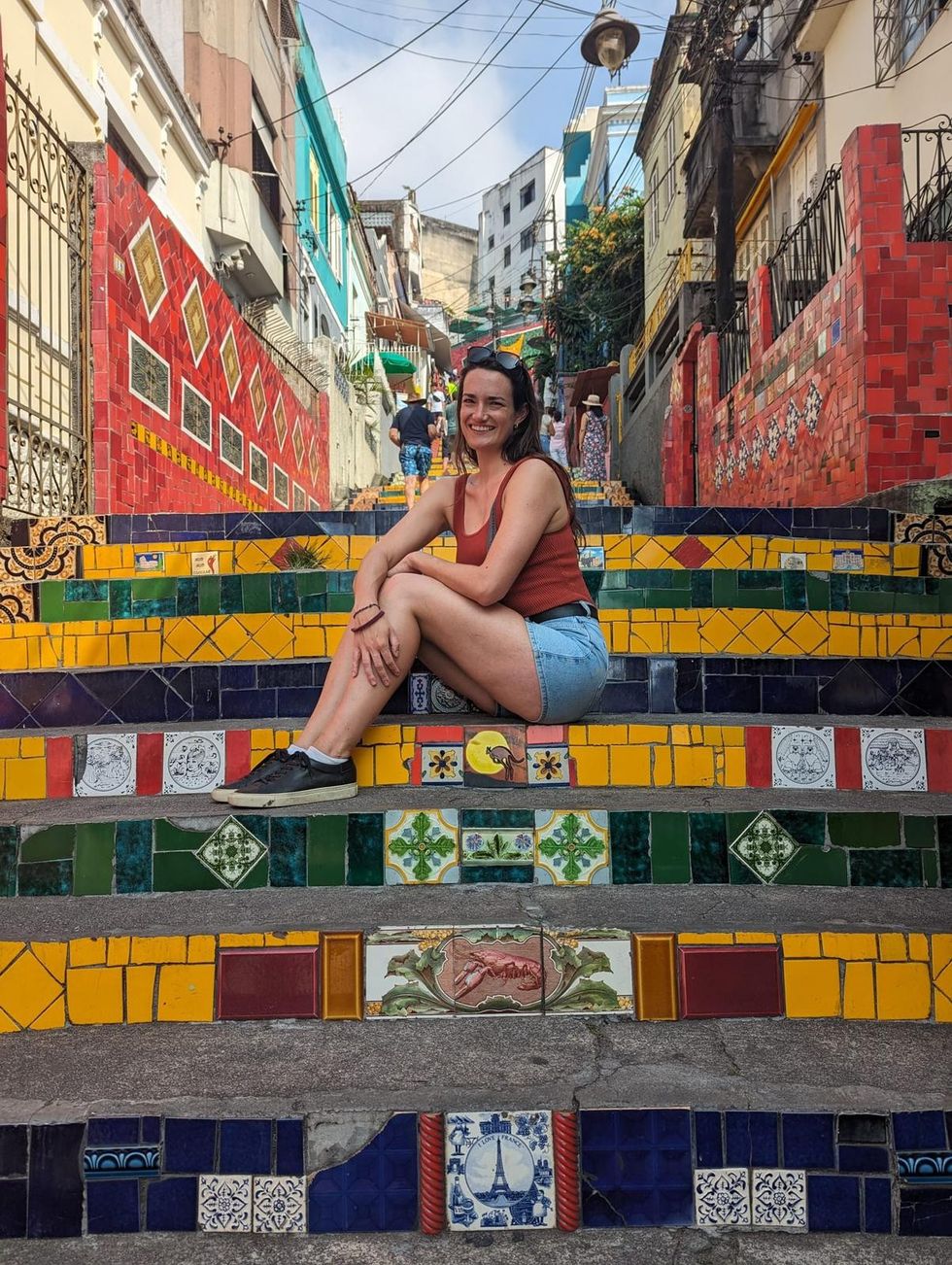 Jas sitting on Selaron's Stairs, Rio de Janeiro