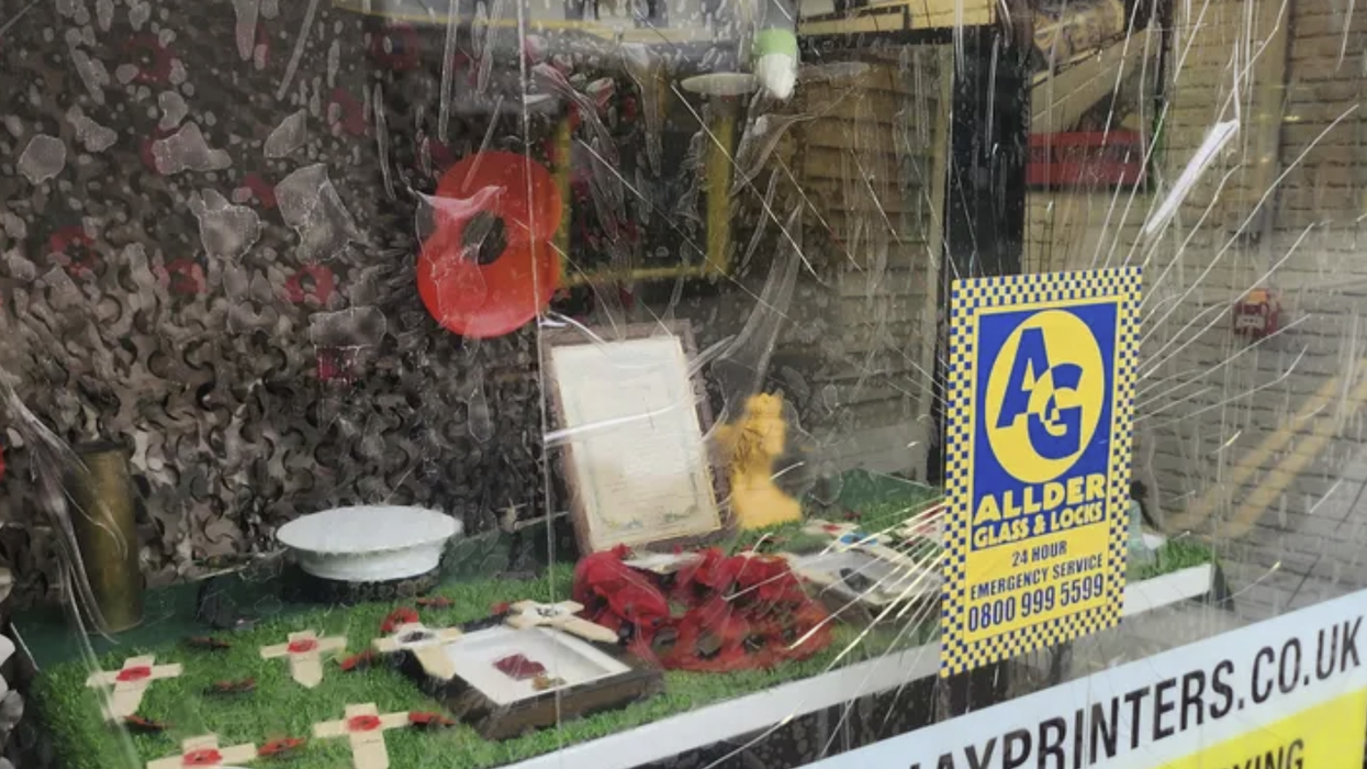 Jay Printers in Wokingham was vandalised while a poppy display was put up in its window