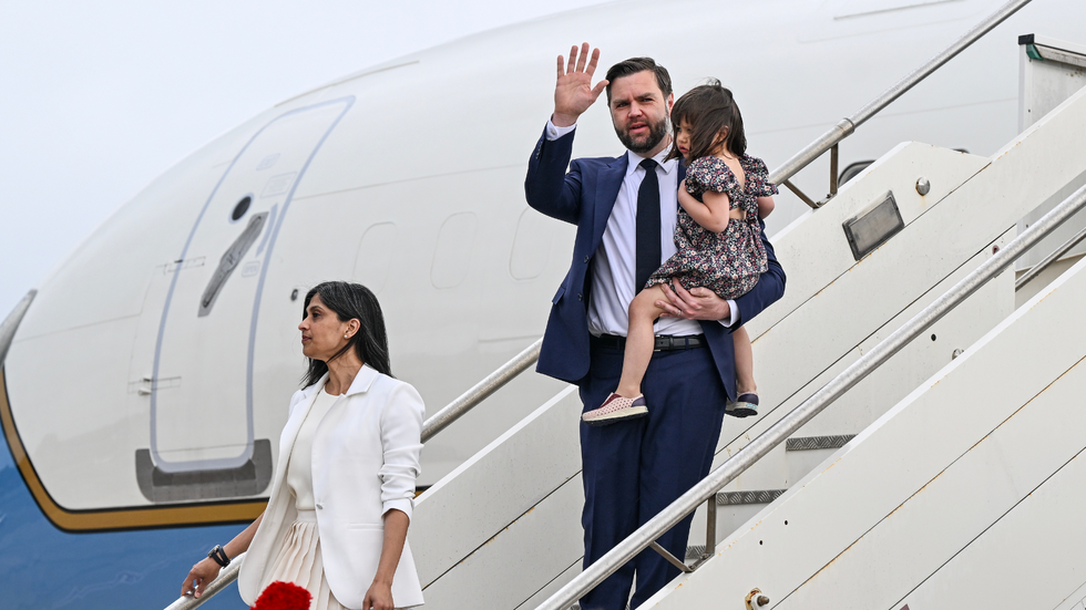 JD Vance and his family exiting a plane