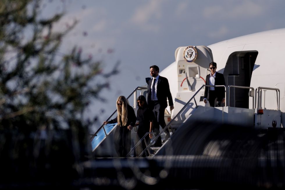 JD Vance, Usha Vance and Erika Kirk leaving Air Force Two