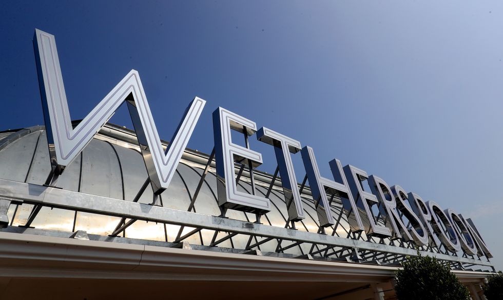 JD Wetherspoon logo outside a pub
