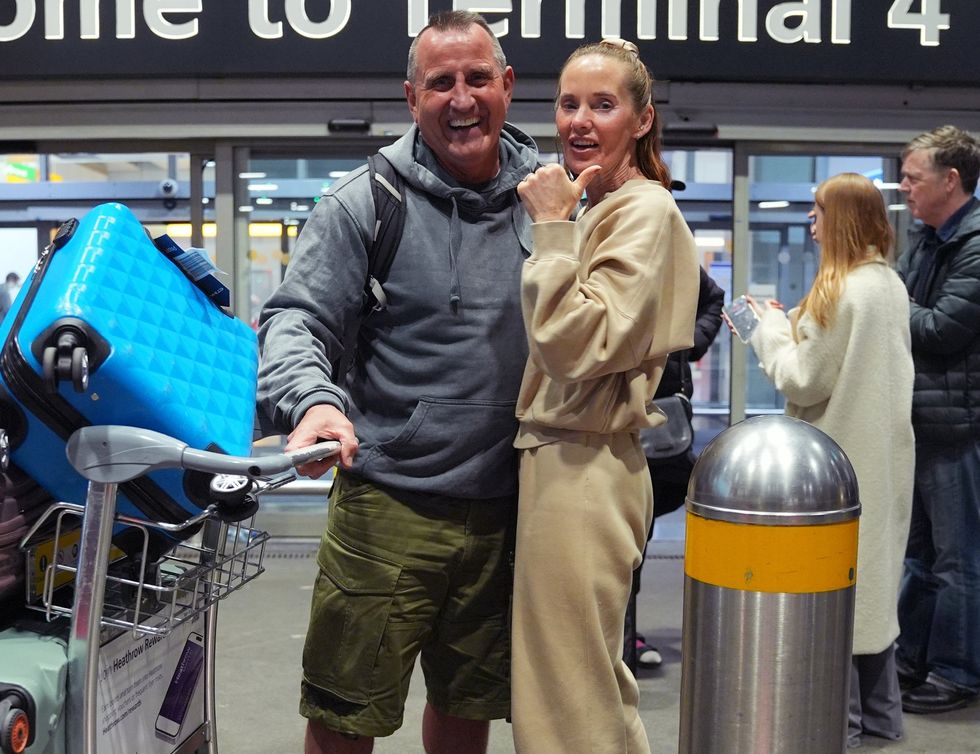 Jeff and Rebecca Moses return to England's Heathrow Terminal 4 from Abu Dhabi