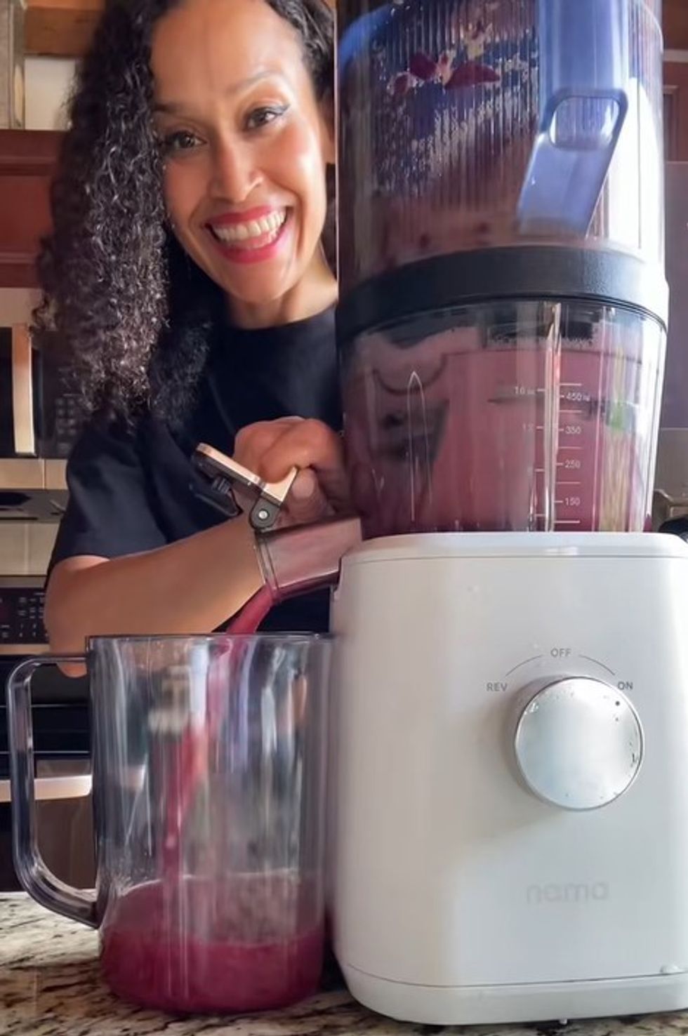 Jen Jones making her juice