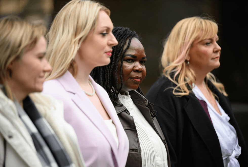 Jennifer Melle (3R), a nurse at St Helier Hospital, is joined by NHS nurses Sandie Peggie (L), Bethany Hutchinson (2L) and Lisa Lockey (R) at a photo-call at Parliament Square on January 19, 2026 in London, England.