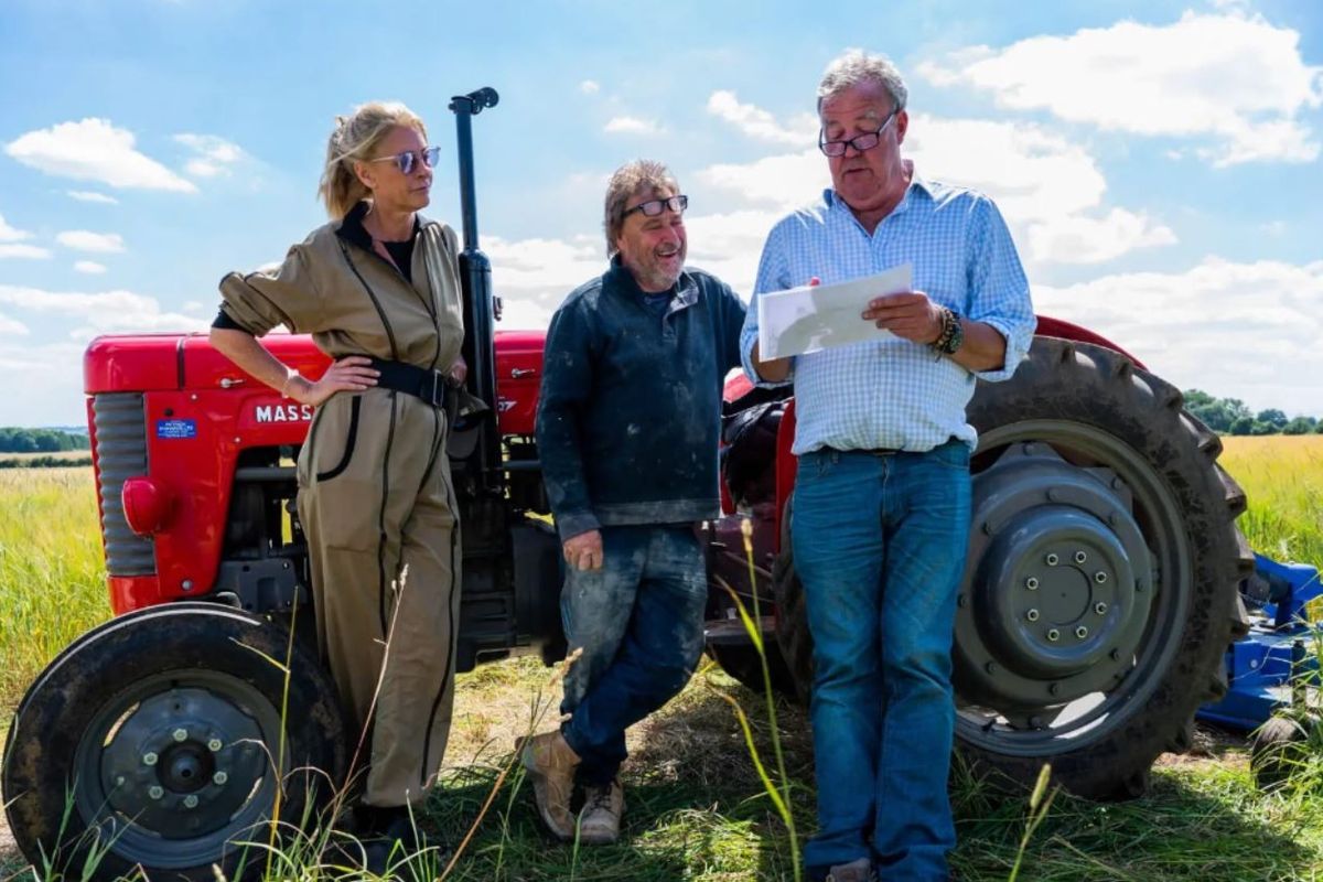 Jeremy Clarkson and Lisa Hogan with their builder Alan