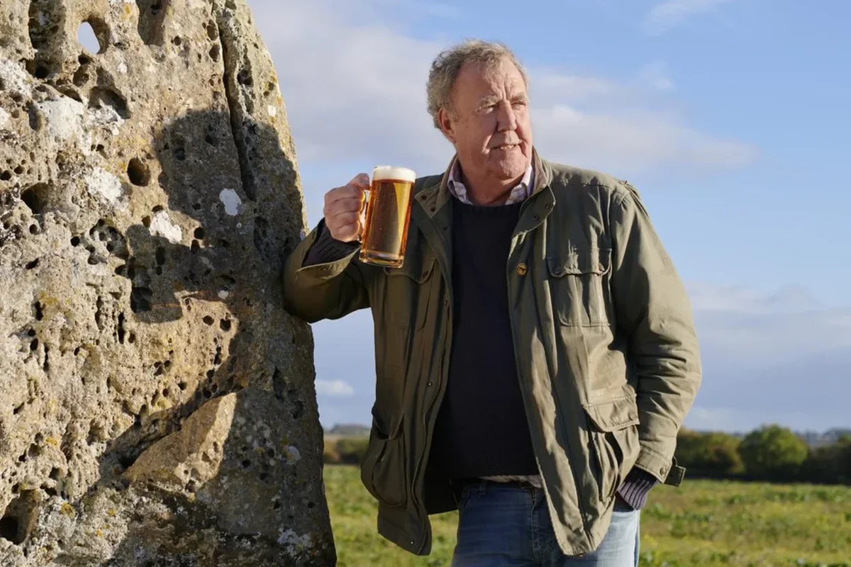 jeremy clarkson pictured with a pint of hawkstone lager outdoors