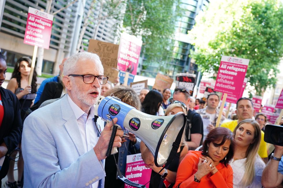 Jeremy Corbyn and demonstrators protest outside the Home Office in London against plans to send migrants to Rwanda and demand the Government cancels the first scheduled flight on Tuesday.