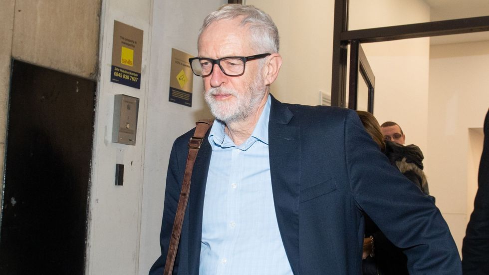 Jeremy Corbyn leaving a meeting