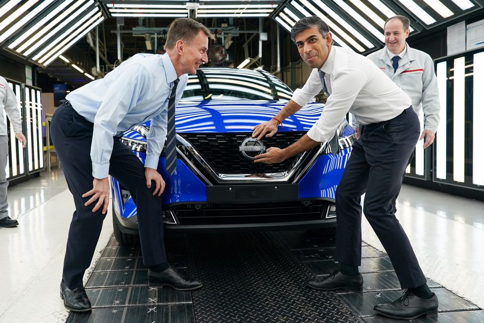 Jeremy Hunt and Rishi Sunak at the Nissan EV plant in Sunderland