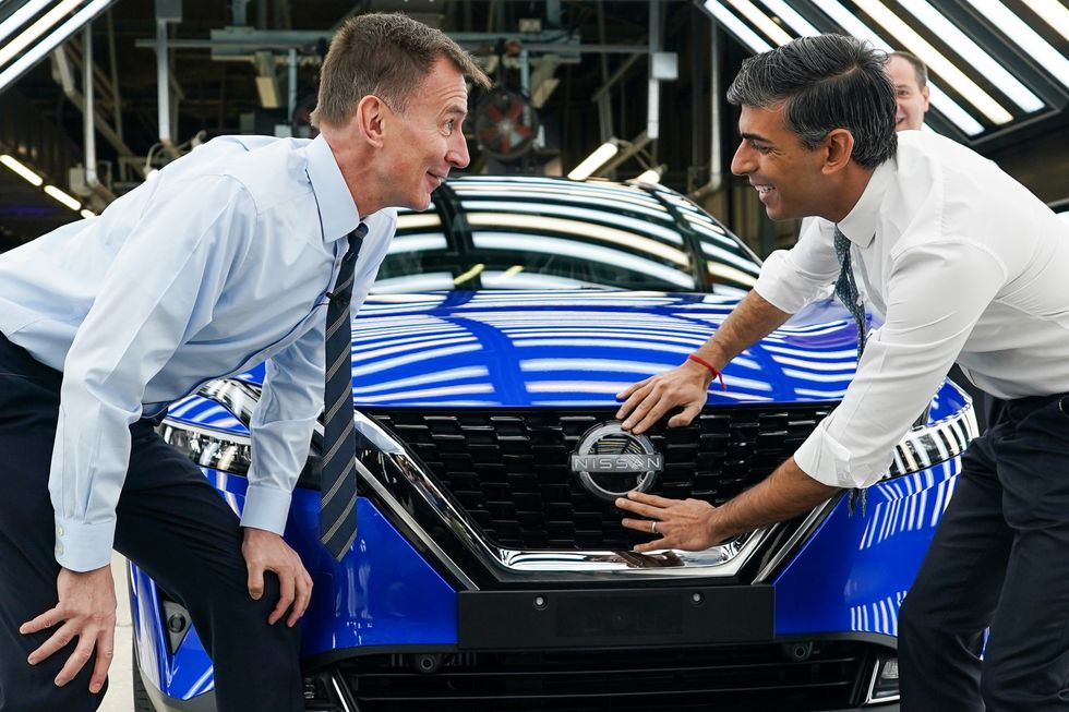 Jeremy Hunt and Rishi Sunak at the Sunderland EV factory