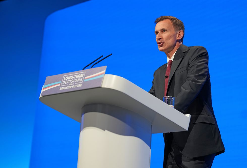 Jeremy Hunt delivers speech during the Conservative Party annual conference in Manchester