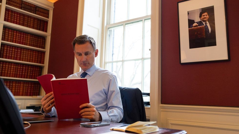 Jeremy Hunt reading his Budget
