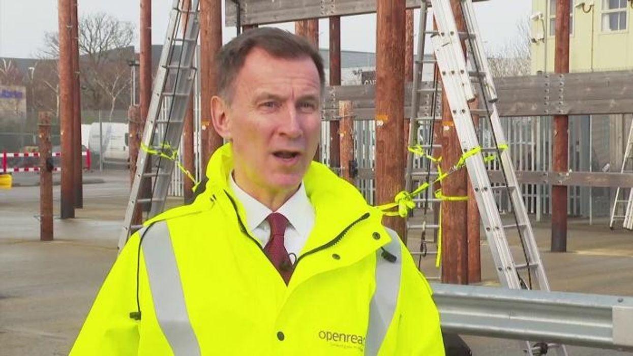 Jeremy Hunt pledges to cut taxes as UK economy ‘turning a corner’