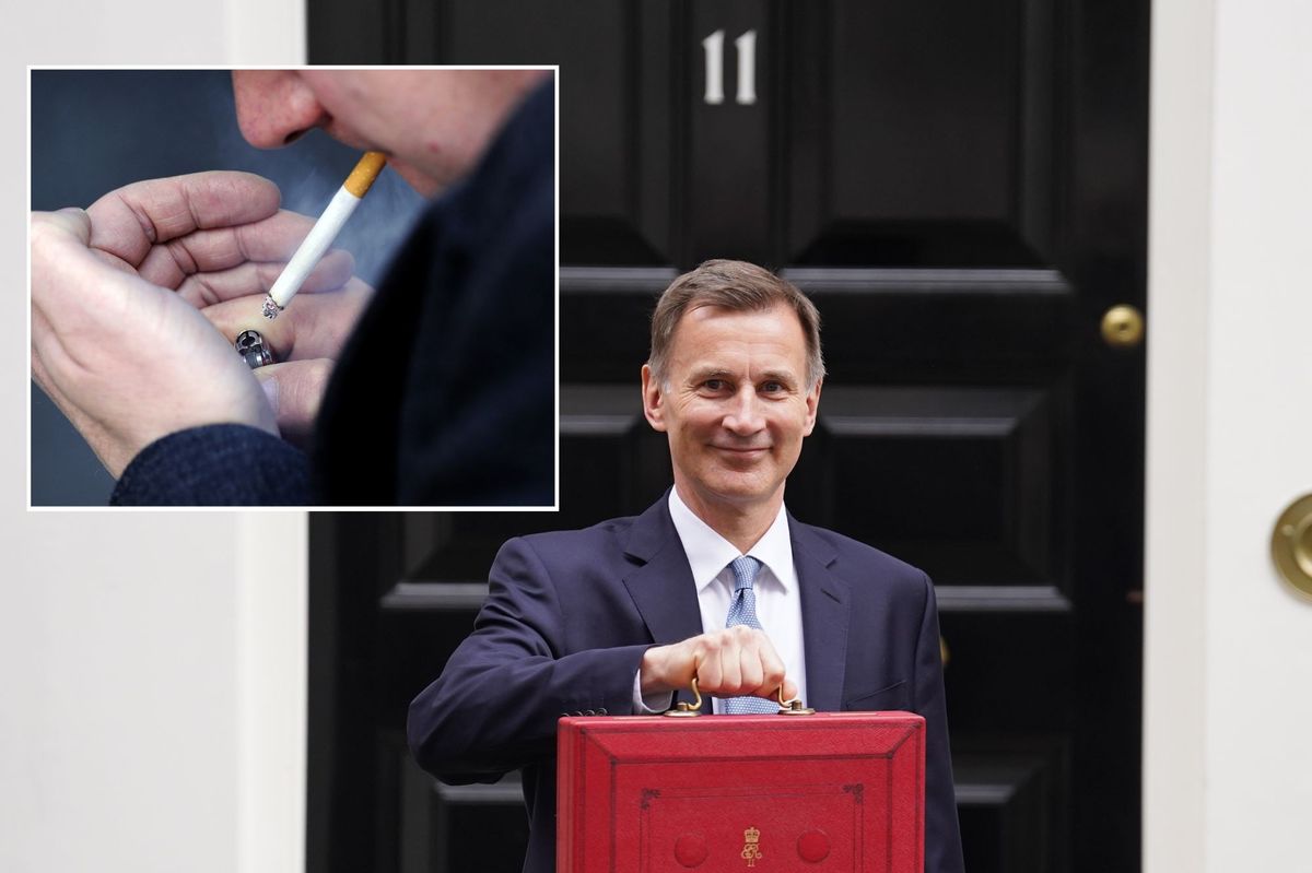 Jeremy Hunt with a red brief case