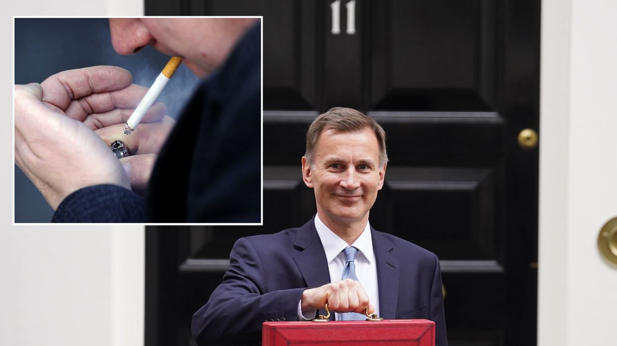 Jeremy Hunt with a red brief case