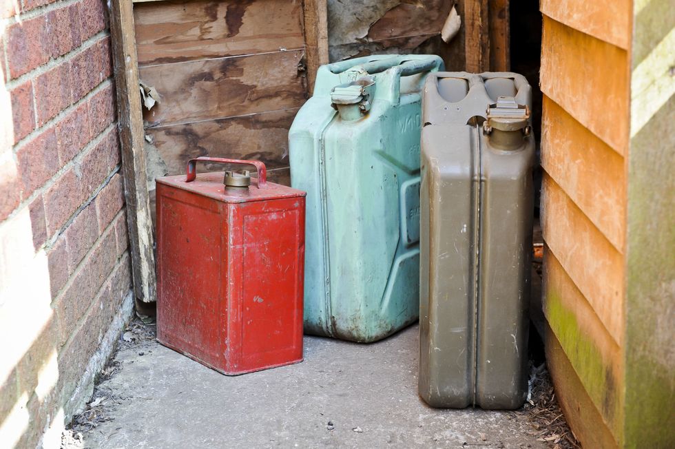 Jerry cans stored in a shed