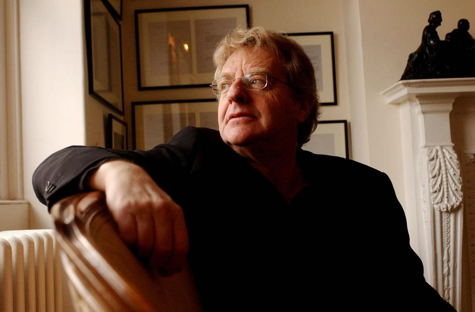 Jerry Springer looking out of a window