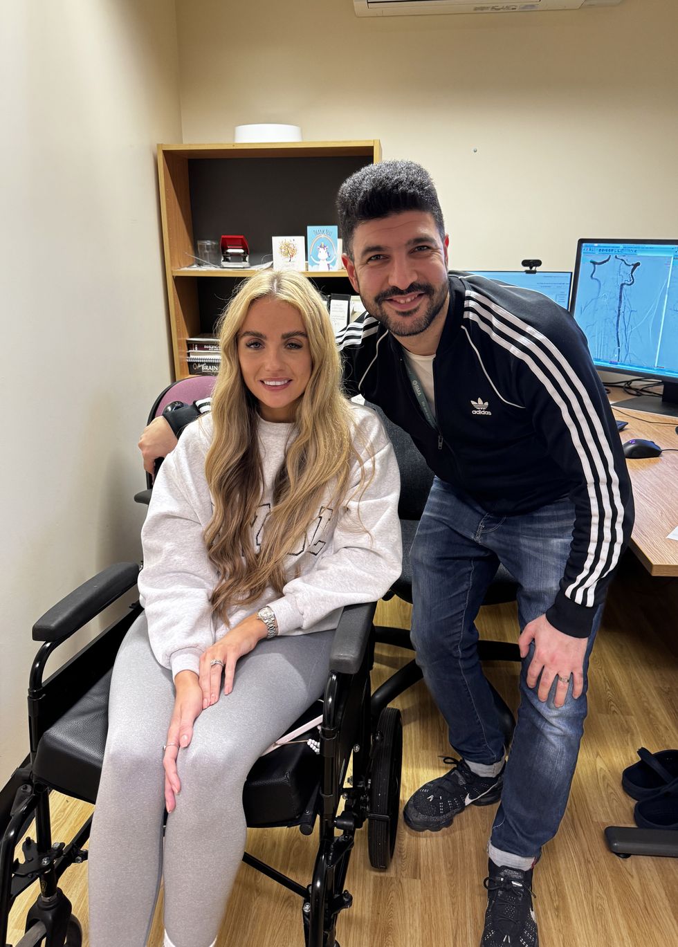 Jess Tierney with Dr Souhyb Masri, a consultant interventional neuroradiologist at the Walton Centre.