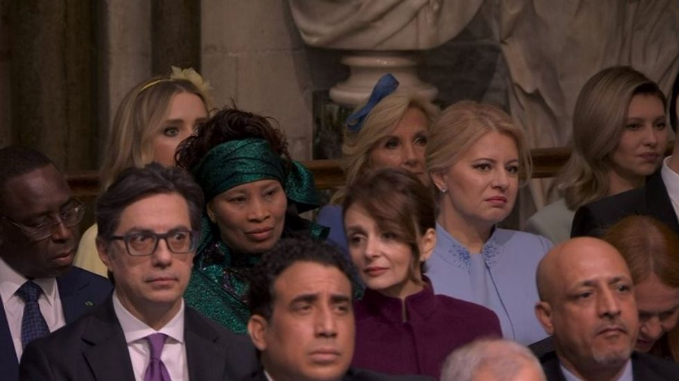 Jill Biden can be seen tucked away at the back of Westminster Abbey