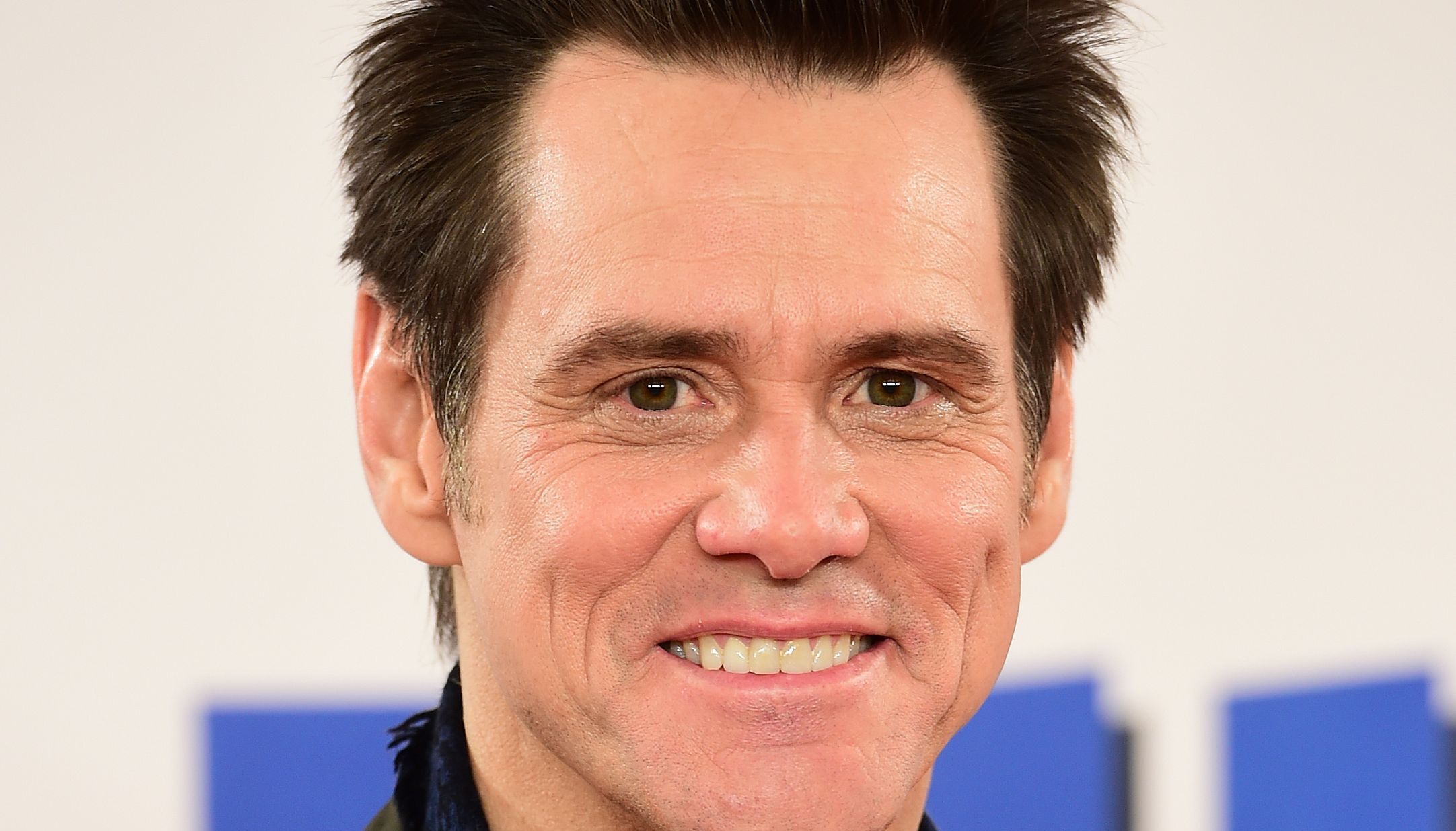 Jim Carrey attending a photocall for his new film, Dumb And Dumber To, at the Connaught Hotel in London.