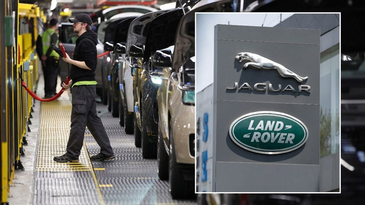 JLR worker and a JLR sign