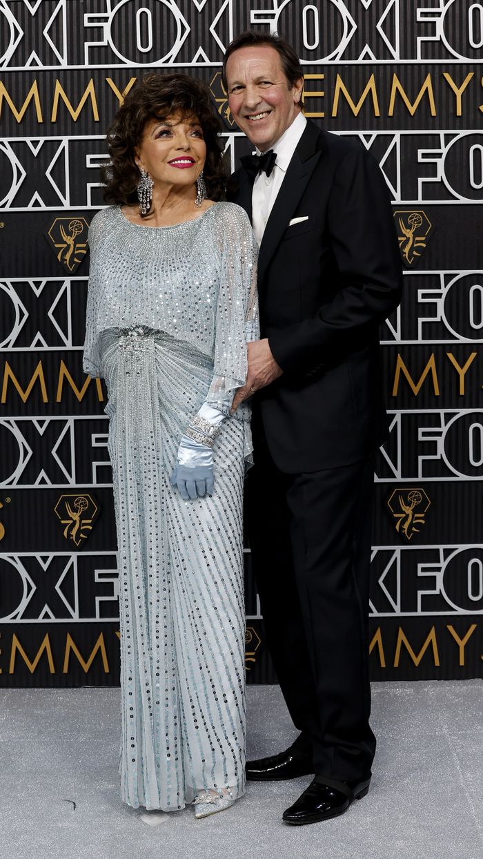 Joan Collins and her husband