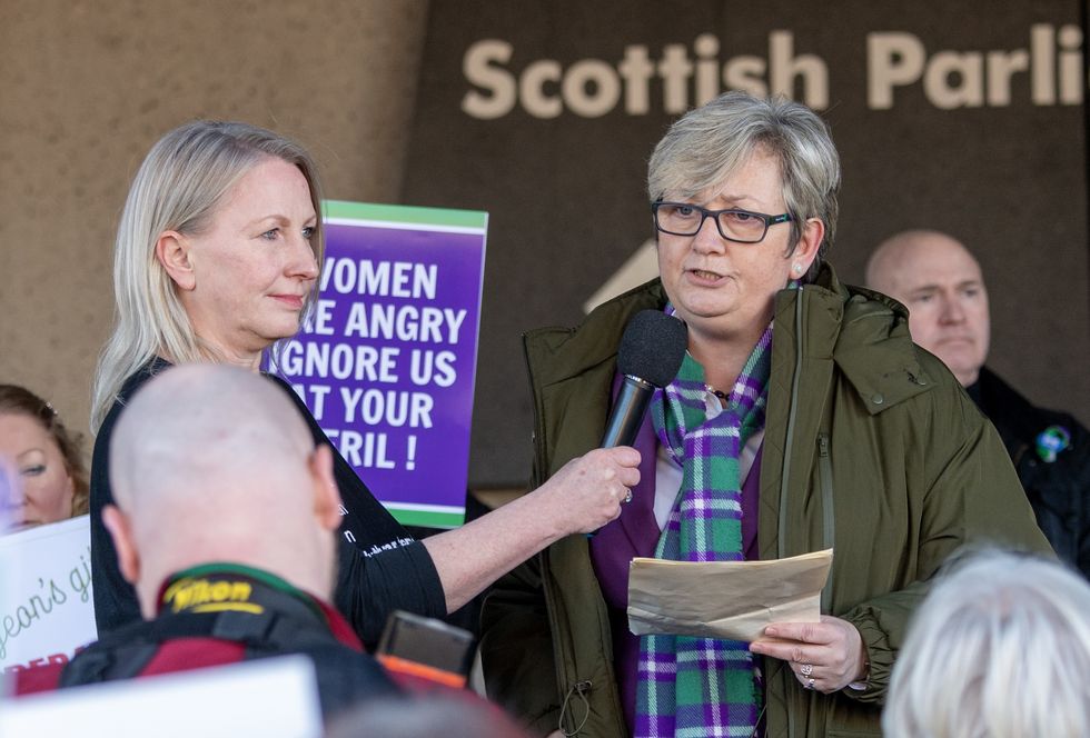Joanna Cherry speaks at the For Women Scotland and the Scottish Feminist Network demonstration outside the Scottish Parliament in Edinburgh