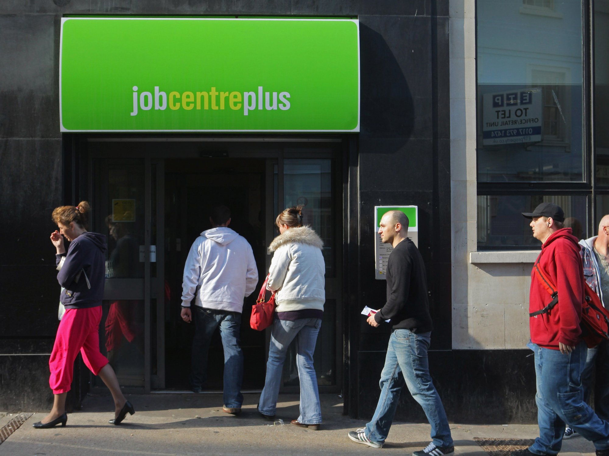 Job seekers enter job centre