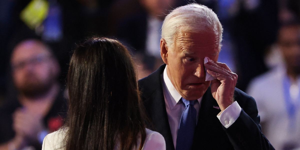 NextImg:Joe Biden breaks down in tears as he symbolically passes torch to Kamala Harris