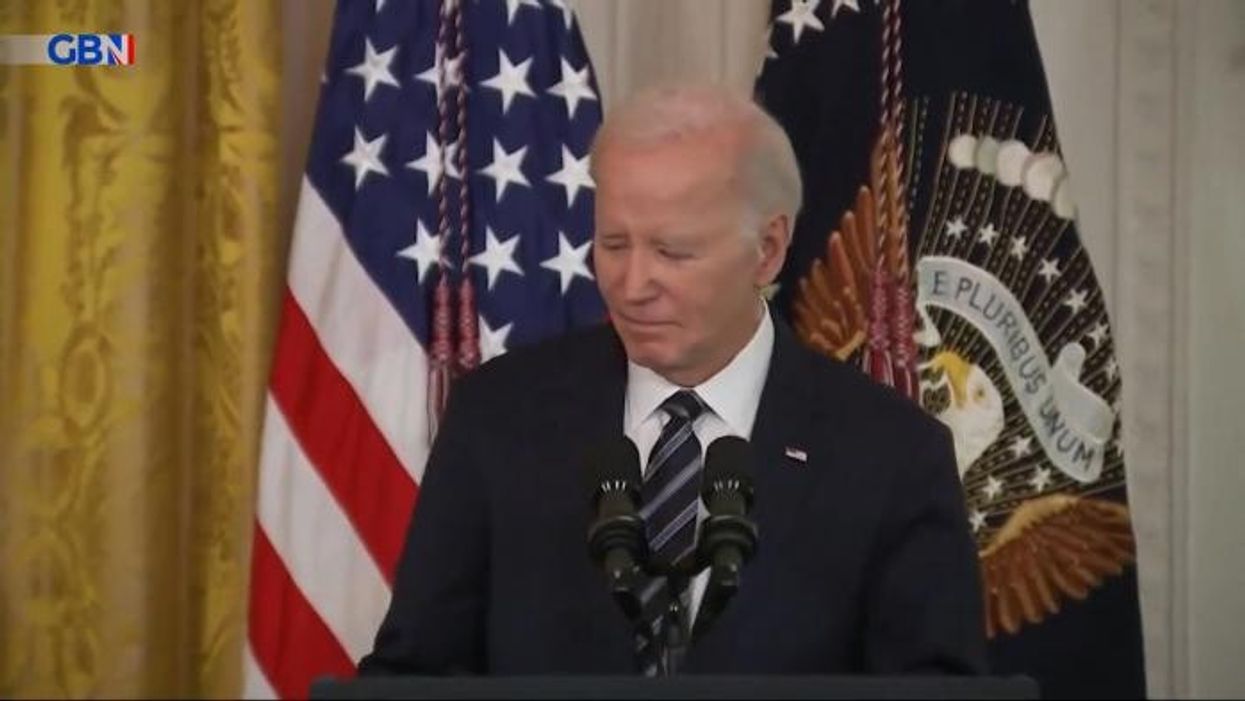 WATCH: Joe Biden confused at awards ceremony as he relies on handlers to direct him