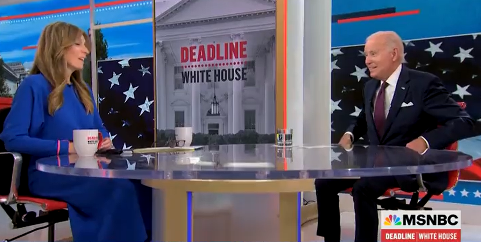 Joe Biden chatting to Nicolle Wallace