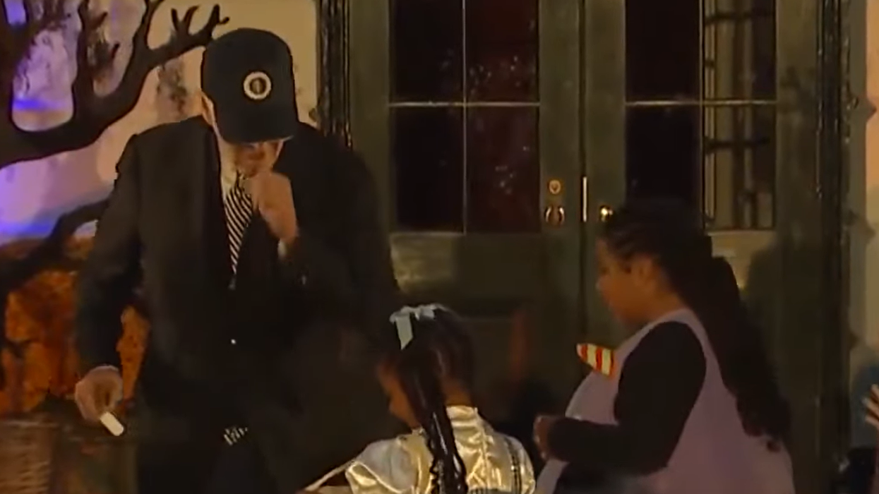 Joe Biden coughing during the White House's Halloween event