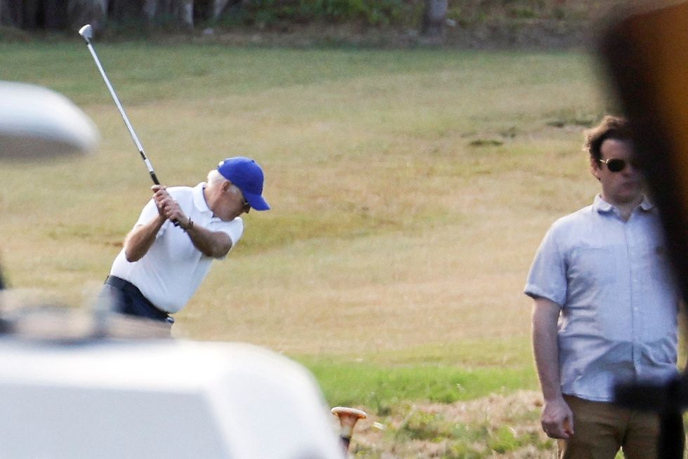 Joe Biden has gone on a golfing holiday in the same month the US was crippled by storms and the economy tanked.